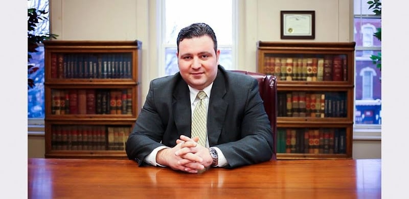 327640 mouganis law firm